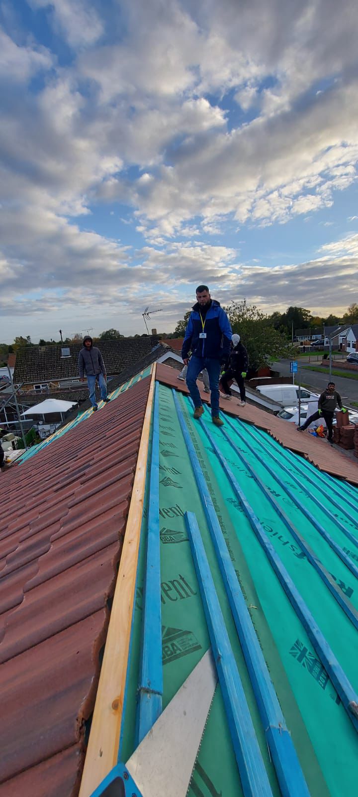 Residential property with scaffolding for roof repair