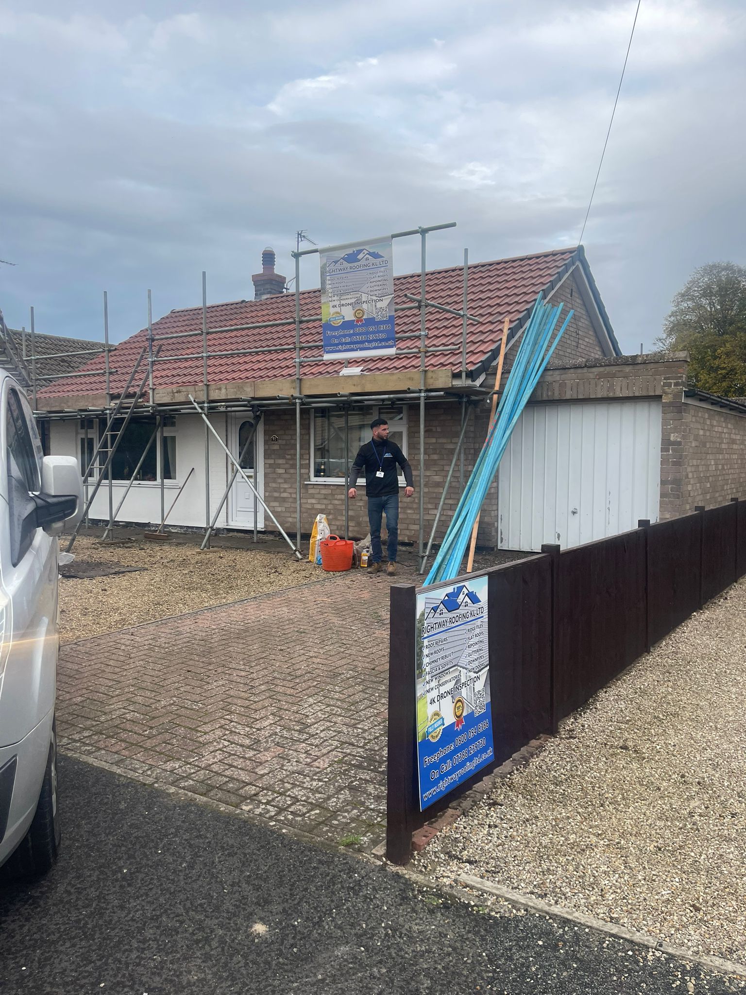 Dusk roofing work showing professional installation standards