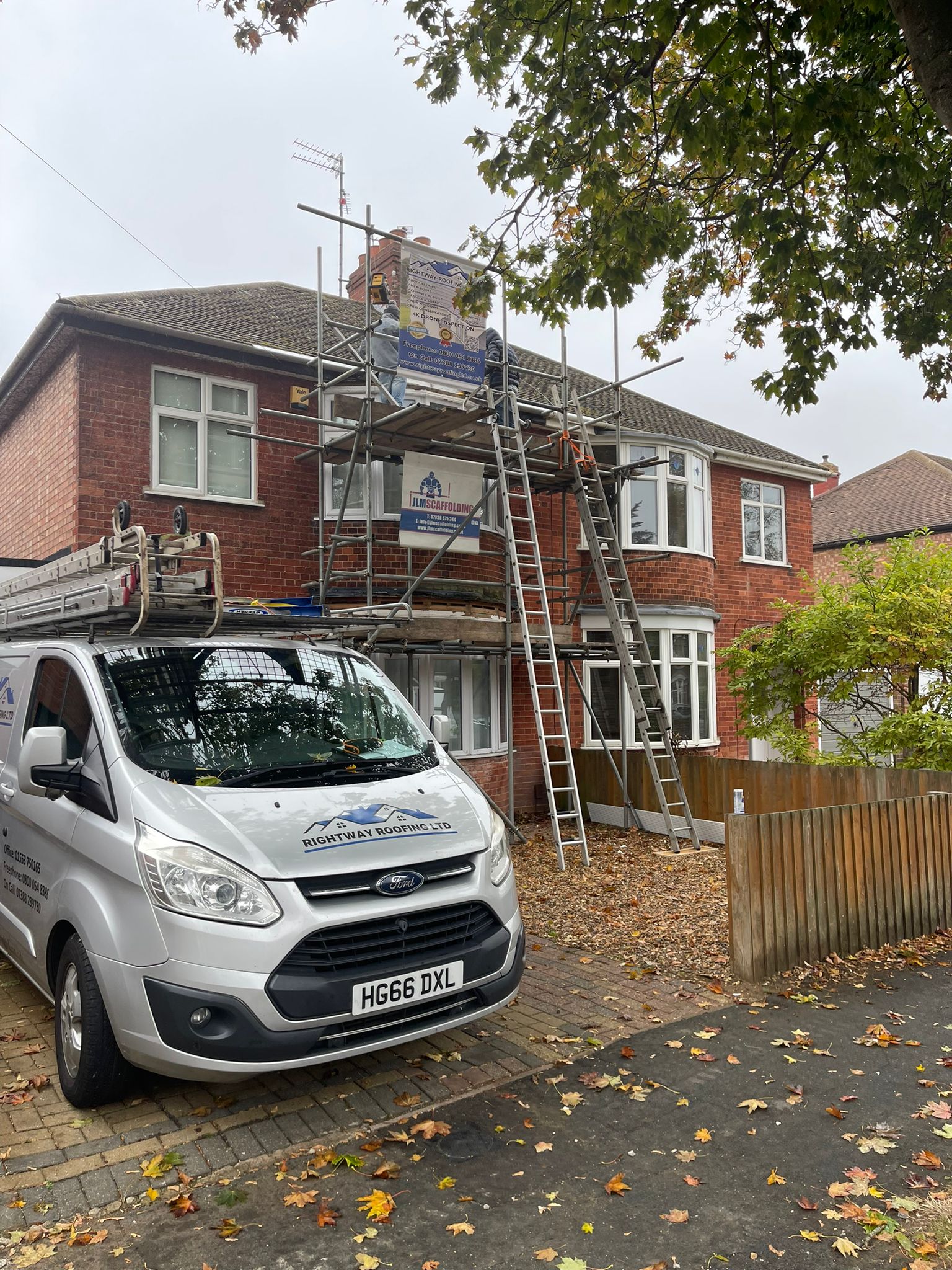 Residential property with Rightway Roofing van and scaffolding