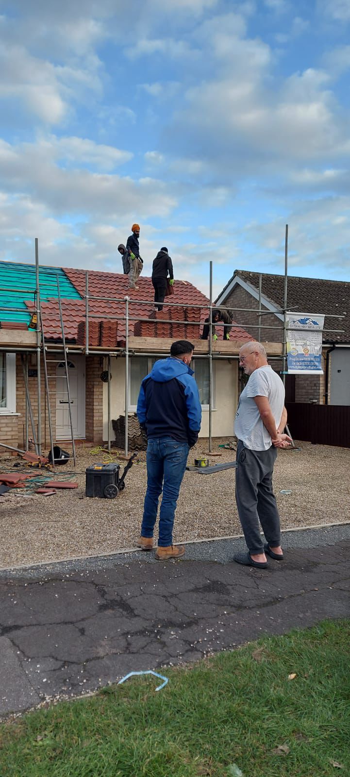 Scaffolding and roofing materials on site