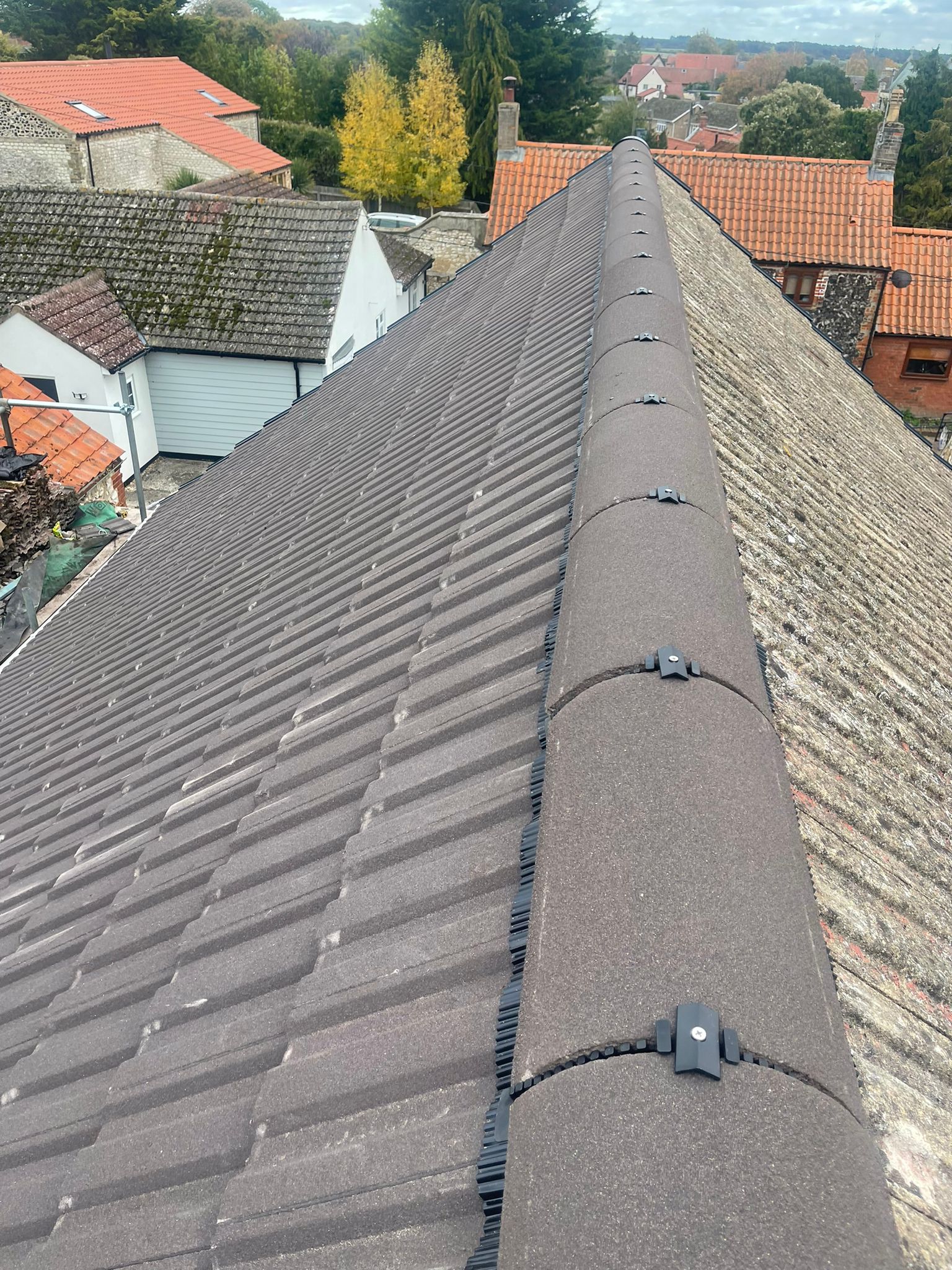 Company van and scaffolding setup at bungalow project