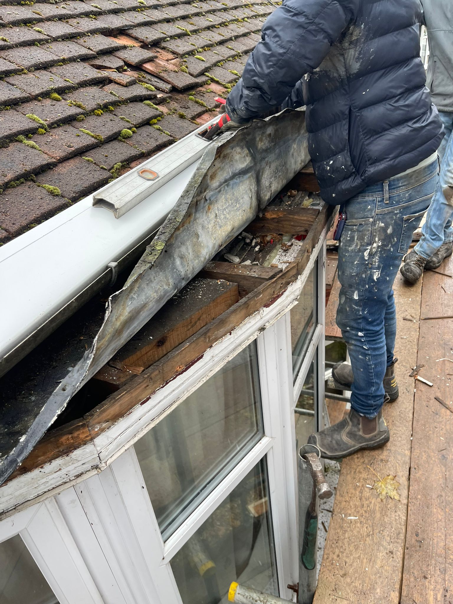 Street view of roofing project with company setup
