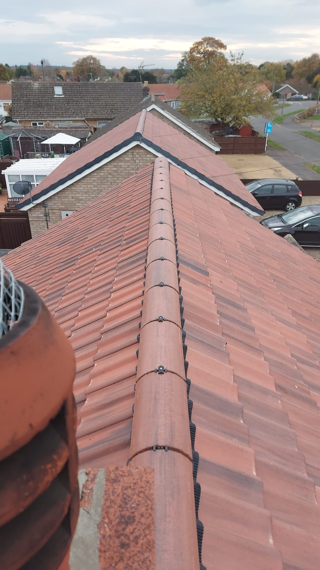 Ridge tiles detail work on residential property - Rightway Roofing Ltd