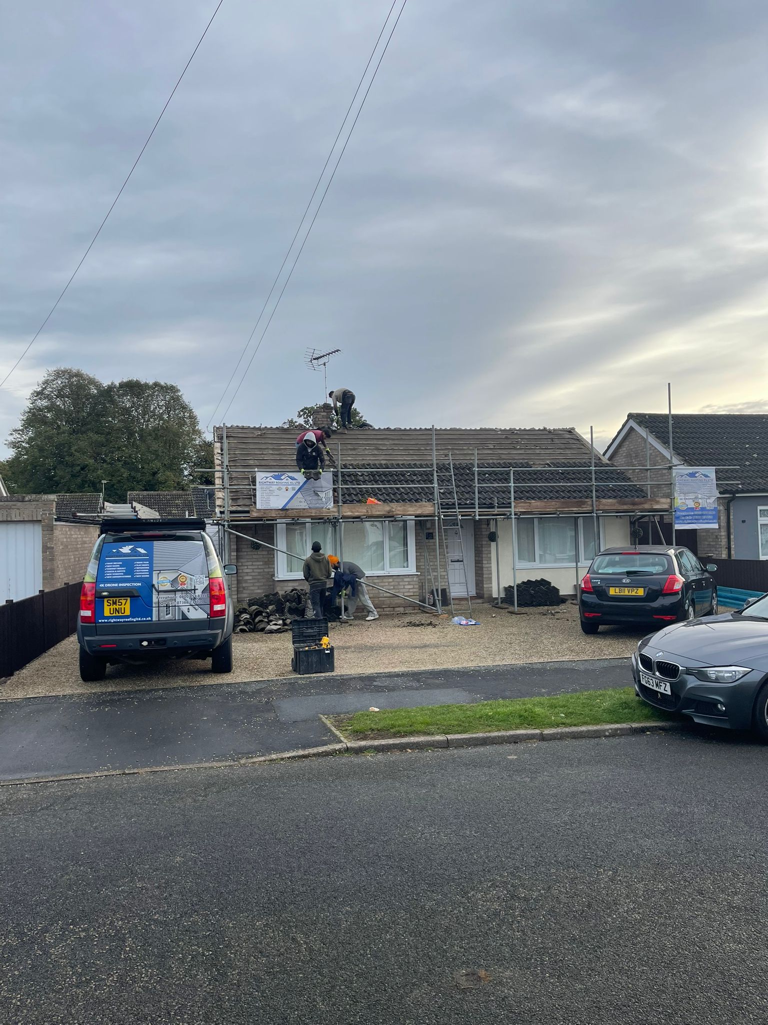 Bungalow scaffolding setup for roofing project