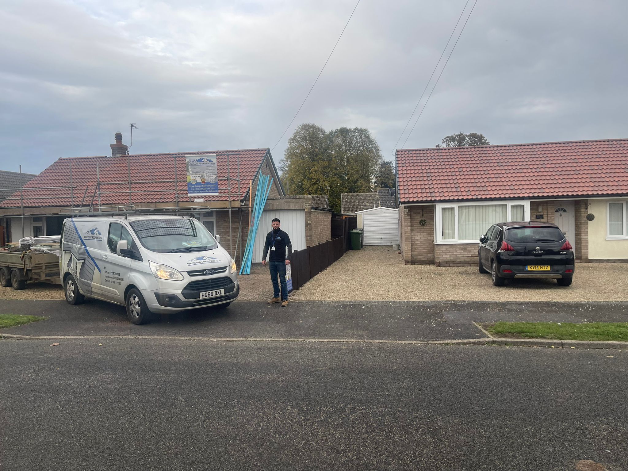 Rightway Roofing company van and team member on site